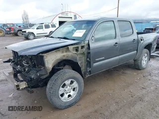 2013 Toyota Tacoma with VIN 3TMLU4EN7DM113315, listed as a IAAI auction lot 41938415 with 228,912 mi miles and . Bid and sale history available at DreamBid. Image 2.