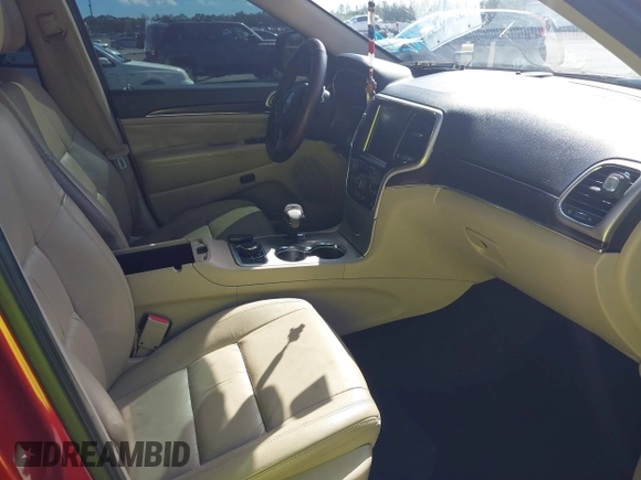 2014 Jeep Grand Cherokee Limited z VIN 1C4RJFBG4EC447633, wystawiony jako IAAI lot #41688829 z przebiegiem 109 472 mil mil oraz . Historia ofert i sprzedaży dostępna na DreamBid. Obrazek 5.