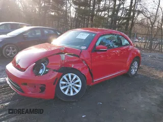 2019 Volkswagen Beetle S with VIN 3VWFD7AT1KM712384, listed as a IAAI auction lot 41505127 with 49,527 mi miles and . Bid and sale history available at DreamBid. Image 2.