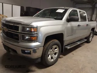 2014 Chevrolet Silverado 1500 LT with VIN 3GCUKREC4EG291351, listed as a IAAI auction lot 41732290 with 194,135 mi miles and . Bid and sale history available at DreamBid. Image 17.