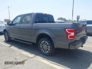 2018 Ford F-150 XL with VIN 1FTEW1CPXJKD56562, listed as a IAAI auction lot 42588371 with 137,496 mi miles and . Bid and sale history available at DreamBid. Image 3.