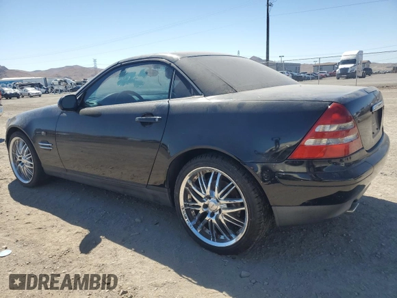 1998 Mercedes-Benz SLK-Class with VIN WDBKK47F8WF031084, listed as a Copart auction lot 67831314 with 128,982 mi miles and Clean Title. Bid and sale history available at carsss.com. Image 2.