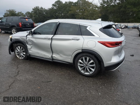 2021 Infiniti QX50 Luxe z VIN 3PCAJ5BA7MF104724, wystawiony jako Copart lot #83643884 z przebiegiem 49 300 mil mil oraz Szkoda całkowita • Salvage title. Historia ofert i sprzedaży dostępna na DreamBid. Obrazek 2.