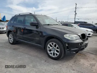 2012 BMW X5 35i z VIN 5UXZV4C51CL989449, wystawiony jako Copart lot #56762095 z przebiegiem 112 576 mil mil oraz Szkoda całkowita • Salvage title. Historia ofert i sprzedaży dostępna na DreamBid. Obrazek 4.