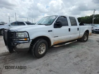 2002 Ford F-250 XL with VIN 1FTNW20F32EA27266, listed as a Copart auction lot 63110855 with 265,546 mi miles and Salvage title. Bid and sale history available at DreamBid. Image 1.