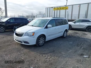 2016 Chrysler Town & Country Touring with VIN 2C4RC1BG8GR205497, listed as a IAAI auction lot 41774882 with 105,159 mi miles. Bid and sale history available at carsss.com. Image 18.