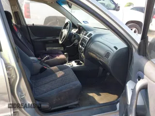 2003 Mazda Protege with VIN JM1BJ245031218333, listed as a IAAI auction lot 42070471 with 181,748 mi miles and . Bid and sale history available at DreamBid. Image 5.
