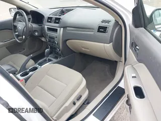 2011 Ford Fusion Hybrid z VIN 3FADP0L34BR202769, wystawiony jako IAAI lot #42504494 z przebiegiem 33 902 mil mil oraz . Historia ofert i sprzedaży dostępna na DreamBid. Obrazek 5.