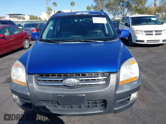 2005 Kia Sportage LX with VIN KNDJF723457057402, listed as a IAAI auction lot 41471742 with 215,565 mi miles and . Bid and sale history available at carsss.com. Image 12.