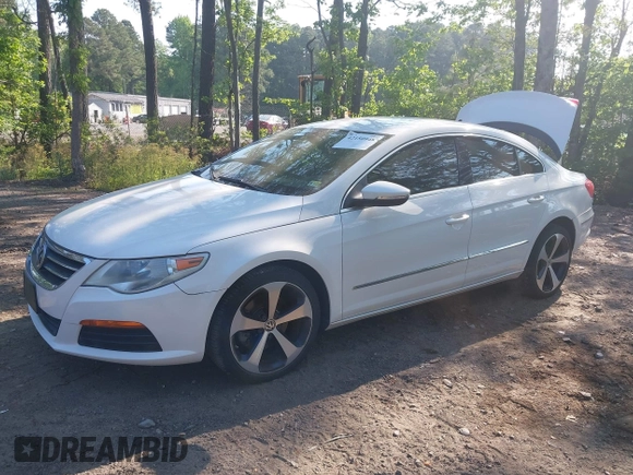 2012 Volkswagen CC Sport PZEV with VIN WVWMP7AN5CE543495, listed as a IAAI auction lot 42150948 with 100,984 mi miles. Bid and sale history available at carsss.com. Image 2.