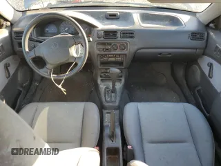 1999 Toyota Tercel z VIN JT2BC53L9X0354072, wystawiony jako Copart lot #73050384 z przebiegiem 163 566 mil mil oraz Szkody całkowita. Historia ofert i sprzedaży dostępna na DreamBid. Obrazek 8.