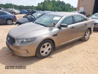 2015 Ford Police Interceptor z VIN 1FAHP2MK2FG135699, wystawiony jako IAAI lot #42614660 z przebiegiem 113 927 mil mil oraz . Historia ofert i sprzedaży dostępna na DreamBid. Obrazek 17.