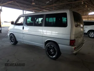 2002 Volkswagen EuroVan с VIN WV2KB47072H012135, выставлен на аукционе Copart как лот 84215364 с пробегом 170 220 миль миль и Чистый • Clean title. История ставок и продаж доступна на DreamBid. Изображение 2.