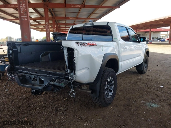 2023 Toyota Tacoma 4WD SR with VIN 3TMCZ5AN8PM650793, listed as a IAAI auction lot 41664712 with 9,427 mi miles. Bid and sale history available at carsss.com. Image 4.