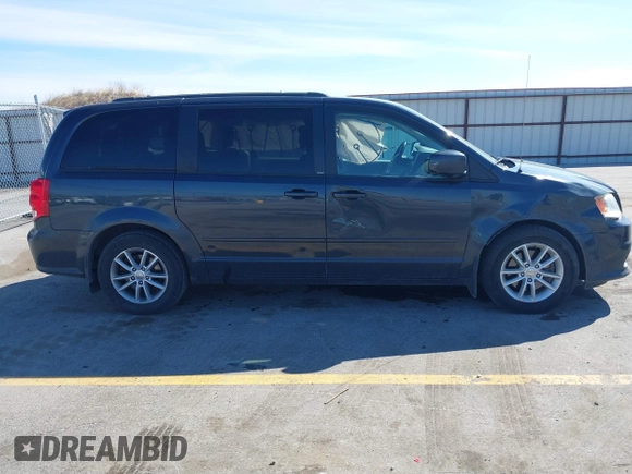 2014 Dodge Grand Caravan SXT with VIN 2C4RDGCG1ER167624, listed as a IAAI auction lot 41888822 with 202,729 mi miles and . Bid and sale history available at DreamBid. Image 13.