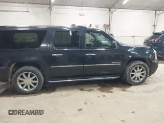 2012 GMC Yukon XL Denali with VIN 1GKS2MEF9CR323393, listed as a IAAI auction lot 41983097 with Not Provided miles. Bid and sale history available at carsss.com. Image 13.