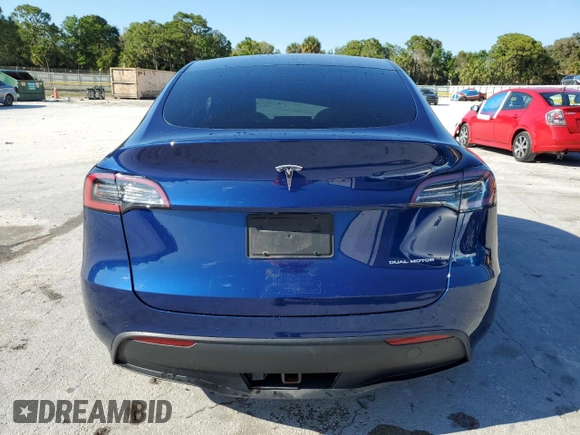 2020 Tesla Model Y Long Range with VIN 5YJYGDEE8LF034719, listed as a Copart auction lot 50888365 with 55,307 mi miles and Salvage Title. Bid and sale history available at DreamBid. Image 6.