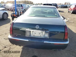 1995 Cadillac Eldorado z VIN 1G6EL12Y1SU623065, wystawiony jako Copart lot #78058414 z przebiegiem 115 060 mil mil oraz Czysty tytuł • Clean title. Historia ofert i sprzedaży dostępna na DreamBid. Obrazek 6.