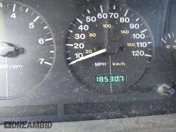 1997 Jeep Grand Cherokee Laredo with VIN 1J4GZ58S0VC550242, listed as a IAAI auction lot 41032114 with 185,307 mi miles. Bid and sale history available at carsss.com. Image 7.