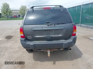 2004 Jeep Grand Cherokee Laredo z VIN 1J4GW48S34C399804, wystawiony jako IAAI lot #42163326 z przebiegiem 203 278 mil mil oraz . Historia ofert i sprzedaży dostępna na DreamBid. Obrazek 16.