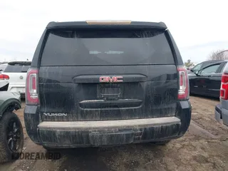 2016 GMC Yukon SLE with VIN 1GKS2AKC2GR357481, listed as a IAAI auction lot 41715909 with 165,377 mi miles. Bid and sale history available at carsss.com. Image 16.