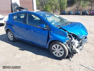 2012 Toyota Prius c One with VIN JTDKDTB38C1527448, listed as a IAAI auction lot 42070550 with 1 mi miles. Bid and sale history available at carsss.com. Image 1.