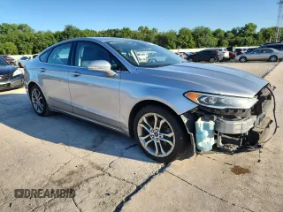 2020 Ford Fusion SEL with VIN 3FA6P0CD7LR196565, listed as a Copart auction lot 63267545 with 82,606 mi miles and Salvage title. Bid and sale history available at DreamBid. Image 4.