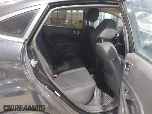 2014 Ford Fiesta SE z VIN 3FADP4BJ0EM174123, wystawiony jako IAAI lot #42294741 z przebiegiem 95 682 mil mil oraz . Historia ofert i sprzedaży dostępna na DreamBid. Obrazek 8.