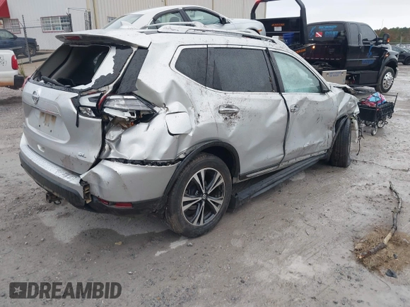 2017 Nissan Rogue SV with VIN JN8AT2MT7HW143178, listed as a IAAI auction lot 41015343 with 139,828 mi miles and . Bid and sale history available at DreamBid. Image 4.