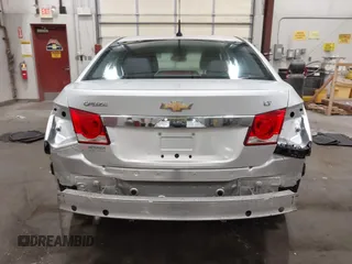 2014 Chevrolet Cruze 1LT z VIN 1G1PC5SB8E7117110, wystawiony jako IAAI lot #42224375 z przebiegiem 81 921 mil mil oraz . Historia ofert i sprzedaży dostępna na DreamBid. Obrazek 18.