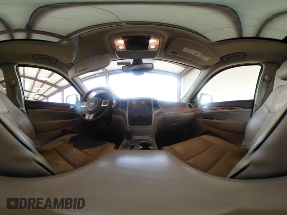 2011 Jeep Grand Cherokee Overland with VIN 1J4RR6GG0BC683624, listed as a IAAI auction lot 42729697 with 212,739 mi miles and . Bid and sale history available at DreamBid. Image 18.