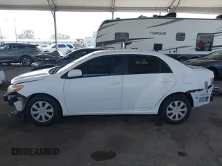 2011 Toyota Corolla L with VIN JTDBU4EE9B9131113, listed as a IAAI auction lot 42028423 with 191,157 mi miles. Bid and sale history available at carsss.com. Image 15.