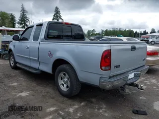 2002 Ford F-150 z VIN 2FTRX17L42CA98695, wystawiony jako IAAI lot #42154232 z przebiegiem 180 924 mil mil oraz . Historia ofert i sprzedaży dostępna na DreamBid. Obrazek 3.