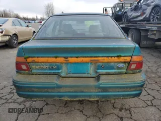1993 Ford Escort with VIN 1FAPP14J4PW287522, listed as a Copart auction lot 47054555 with 547,514 mi miles and Salvage title. Bid and sale history available at DreamBid. Image 6.