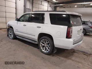 2015 GMC Yukon SLE with VIN 1GKS2AKC6FR103447, listed as a IAAI auction lot 41596220 with 104,209 mi miles. Bid and sale history available at carsss.com. Image 3.