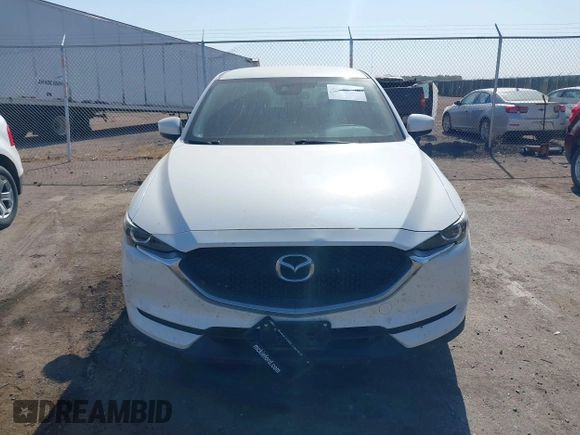 2017 Mazda CX-5 Sport with VIN JM3KFABL5H0124725, listed as a IAAI auction lot 40487298 with 103,889 mi miles. Bid and sale history available at carsss.com. Image 12.