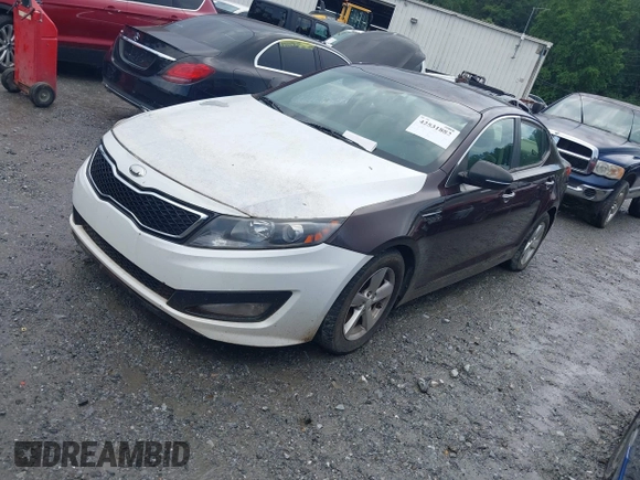2014 Kia Optima LX with VIN 5XXGM4A70EG260667, listed as a IAAI auction lot 42531882 with 147,829 mi miles and . Bid and sale history available at DreamBid. Image 2.
