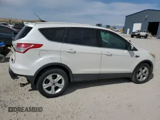 2015 Ford Escape SE with VIN 1FMCU0GX9FUC26779, listed as a Copart auction lot 52772325 with 135,121 mi miles and Salvage Title. Bid and sale history available at DreamBid. Image 3.