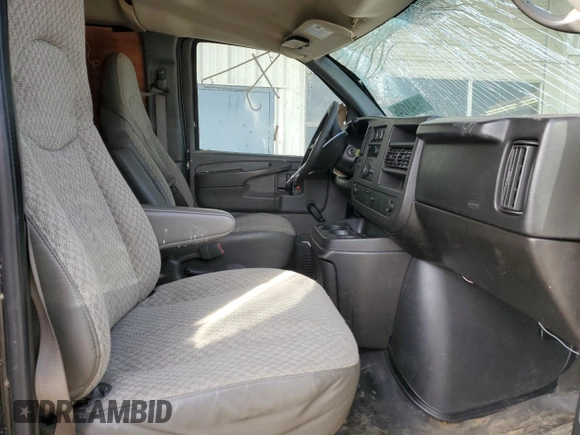 2008 Chevrolet Express Cargo with VIN 1GCFG15X781173411, listed as a Copart auction lot 84648134 with 56,662 mi miles and Salvage title. Bid and sale history available at DreamBid. Image 7.