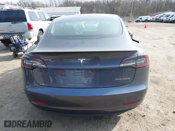 2018 Tesla Model 3 Long Range Battery with VIN 5YJ3E1EB5JF063077, listed as a IAAI auction lot 41773551 with 99,477 mi miles and . Bid and sale history available at DreamBid. Image 16.