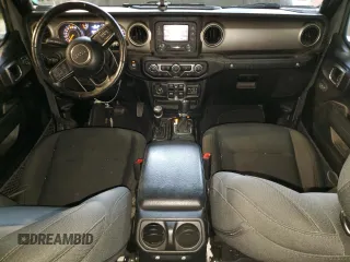 2020 Jeep Wrangler Unlimited Black and Tan with VIN 1C4HJXDG9LW331418, listed as a Copart auction lot 56414765 with 125,339 mi miles and Salvage title. Bid and sale history available at DreamBid. Image 8.