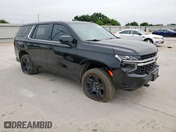 2023 Chevrolet Tahoe Commercial with VIN 1GNSCLED7PR428027, listed as a Copart auction lot 56738455 with 6,599 mi miles and Salvage title. Bid and sale history available at DreamBid. Image 4.