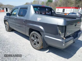 2009 Honda Ridgeline RTL with VIN 2HJYK16539H503533, listed as a IAAI auction lot 42040423 with 206,102 mi miles and . Bid and sale history available at DreamBid. Image 3.