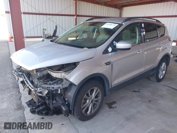 2018 Ford Escape SE with VIN 1FMCU0G90JUC63679, listed as a IAAI auction lot 41658115 with 154,106 mi miles. Bid and sale history available at carsss.com. Image 18.