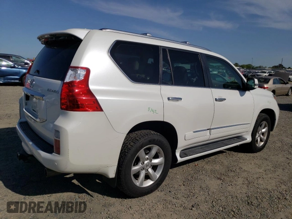 2010 Lexus GX 460 Premium with VIN JTJJM7FX6A5001418, listed as a Copart auction lot 52404285 with 169,065 mi miles and Salvage title. Bid and sale history available at DreamBid. Image 3.