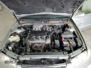 2001 Toyota Camry LE z VIN 4T1BF28K21U963819, wystawiony jako Copart lot #54551465 z przebiegiem 199 472 mil mil oraz Szkoda całkowita • Salvage title. Historia ofert i sprzedaży dostępna na DreamBid. Obrazek 11.