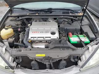 2004 Toyota Camry LE with VIN JTDBF32K740152841, listed as a IAAI auction lot 41808909 with 142,611 mi miles. Bid and sale history available at carsss.com. Image 10.