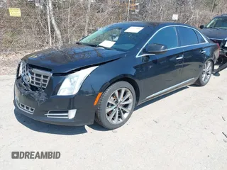2013 Cadillac XTS Luxury with VIN 2G61P5S3XD9220510, listed as a IAAI auction lot 41977046 with 236,009 mi miles and . Bid and sale history available at DreamBid. Image 2.