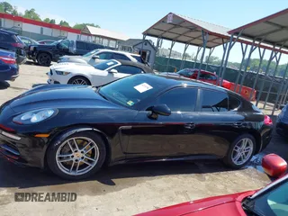 2014 Porsche Panamera z VIN WP0AA2A70EL009084, wystawiony jako IAAI lot #42221798 z przebiegiem 85 853 mil mil oraz . Historia ofert i sprzedaży dostępna na DreamBid. Obrazek 14.