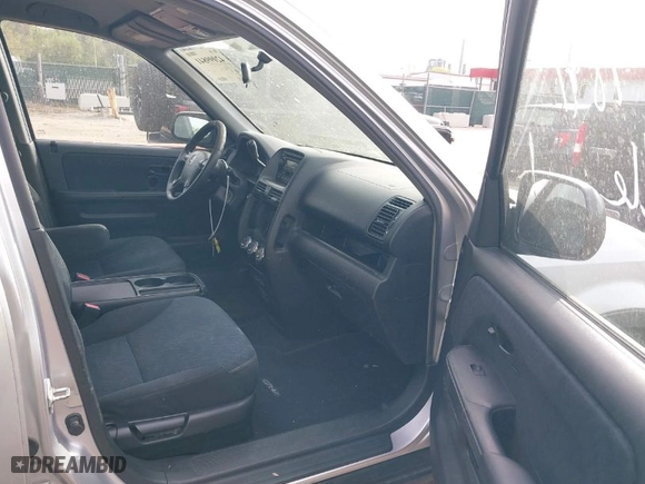 2005 Honda CR-V LX with VIN SHSRD78595U321847, listed as a IAAI auction lot 42099841 with 212,423 mi miles. Bid and sale history available at carsss.com. Image 5.